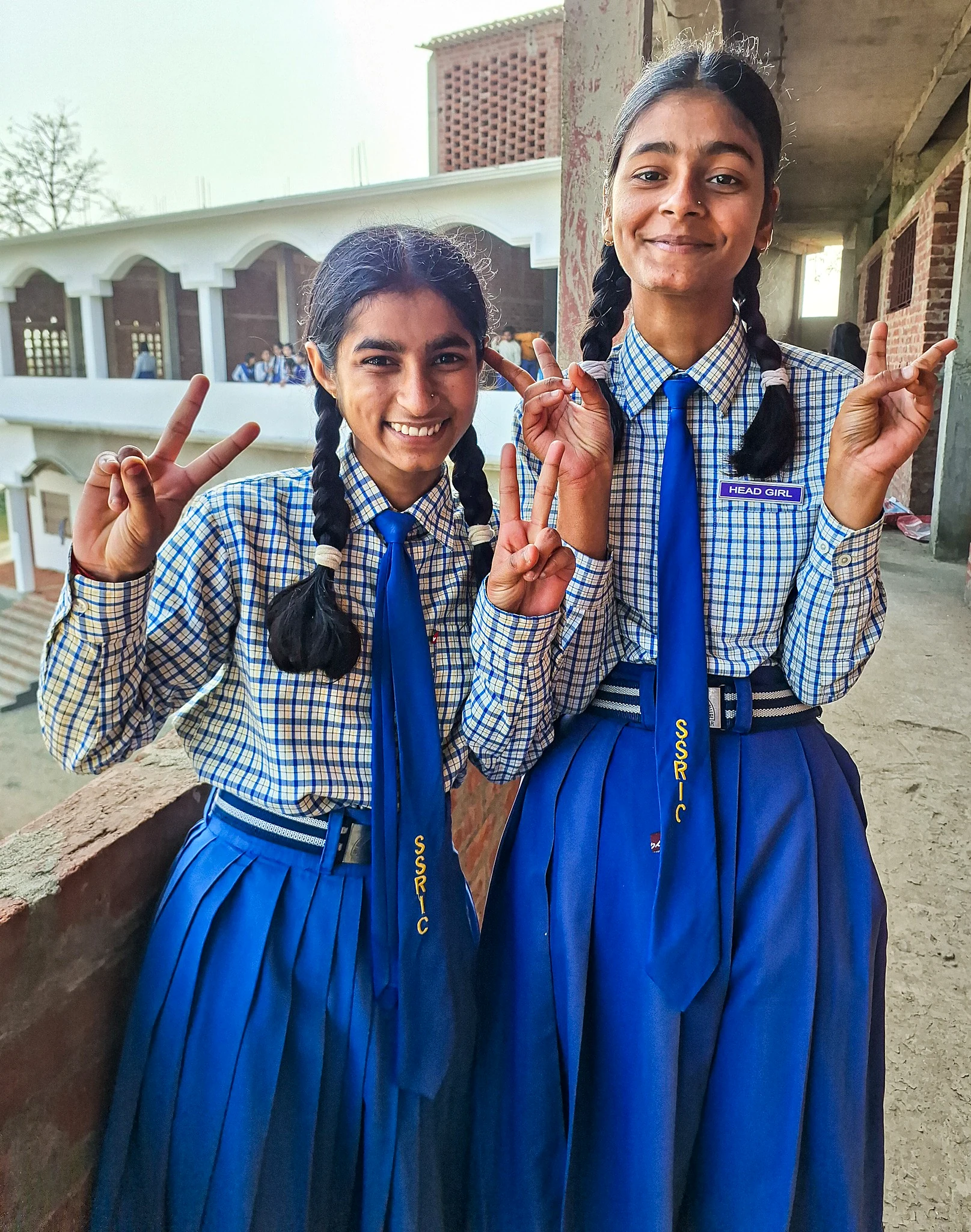 Students proudly displaying medals