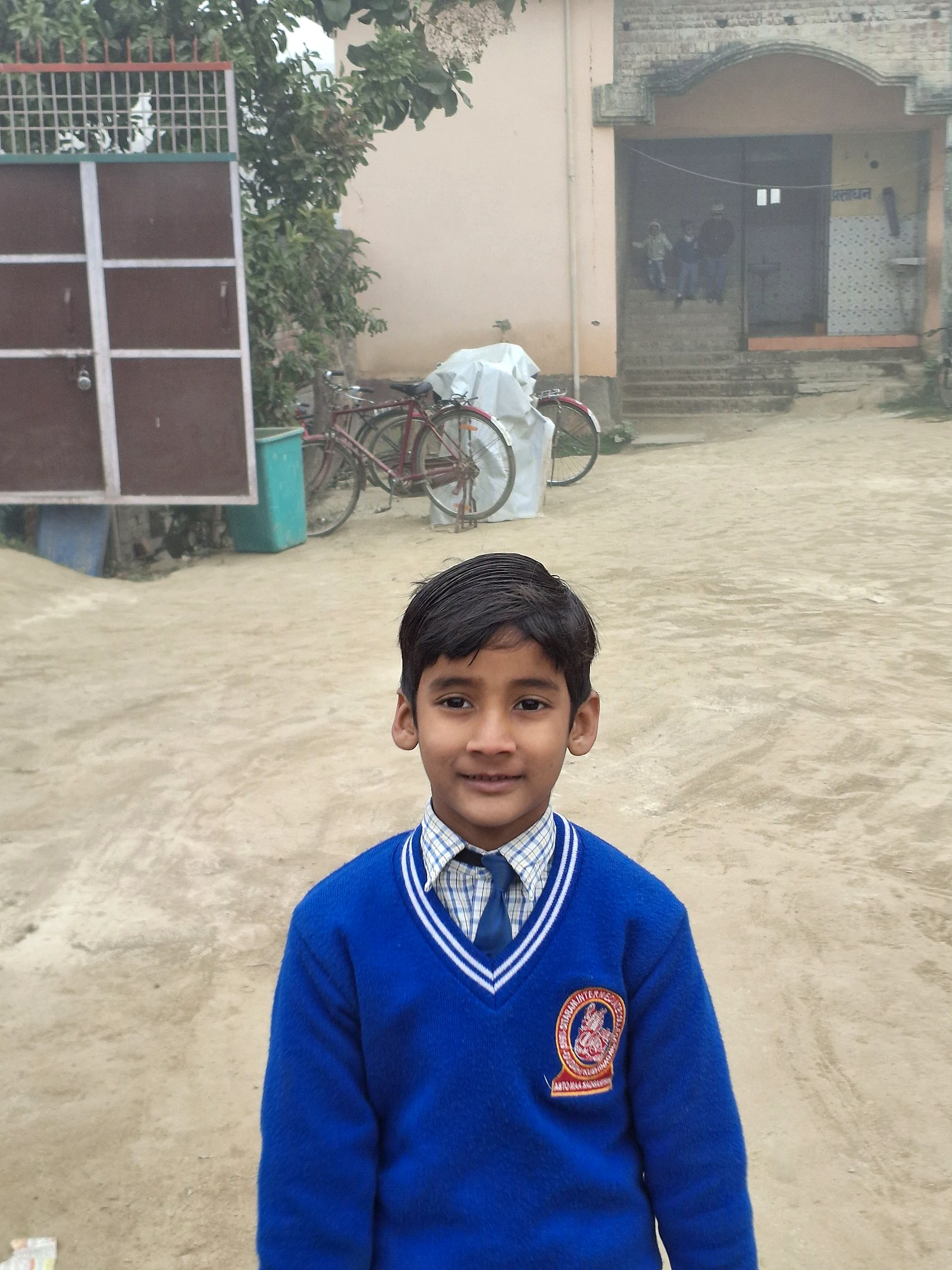 A young primary learner in Shri Sitaram School uniform