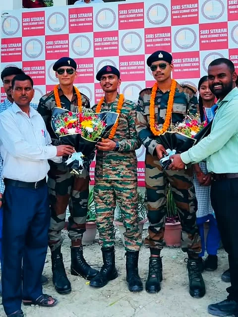 Shri Sitaram alumni in military uniform being honoured during a school felicitation