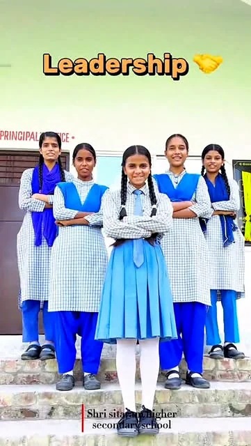 A group of Shri Sitaram schoolgirls standing together outside the school